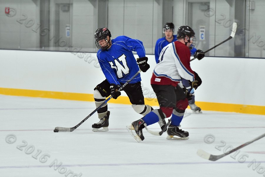 Wheaton College Men\'s Ice Hockey vs Middlesex Community College. - Photo By: KEITH NORDSTROM